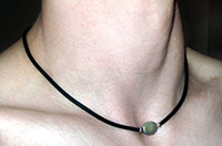 Man's cultured Pearl necklace on black rubber 